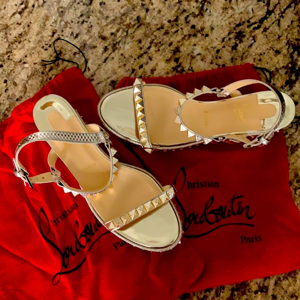 Christian Louboutin metallic sandals. Only worn once indoors on carpet.